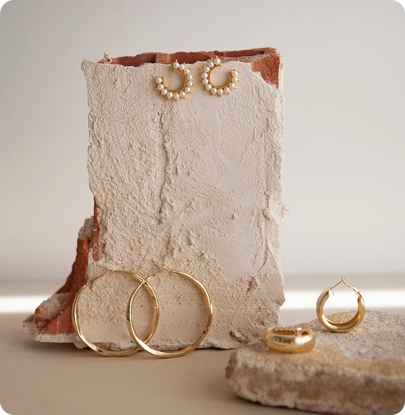 aesthetic golden earrings arrangement